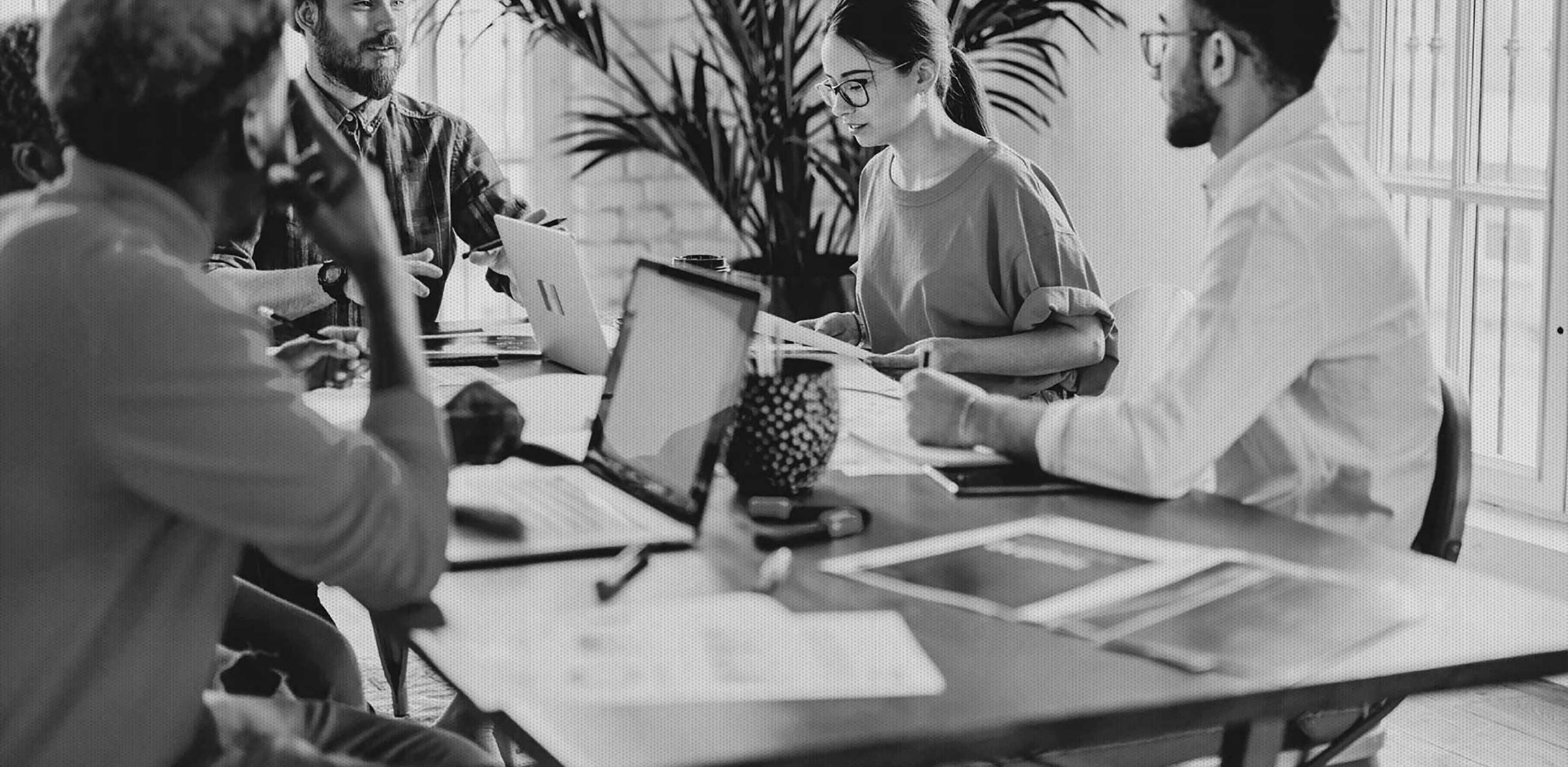 Data migration specialist reviewing system architecture at a workstation